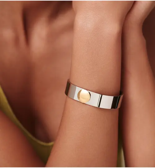 Bransoletka szeroka stalowa z złotym elementem BSA0965